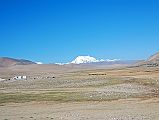 01 Gang Benchen View From Just Past Road Junction From Friendship Highway The road from the Lalung La descends and meets the road junction to the north face of Shishapangma and the road to Mount Kailash, again with a good view of Gang Benchen to the northwest.